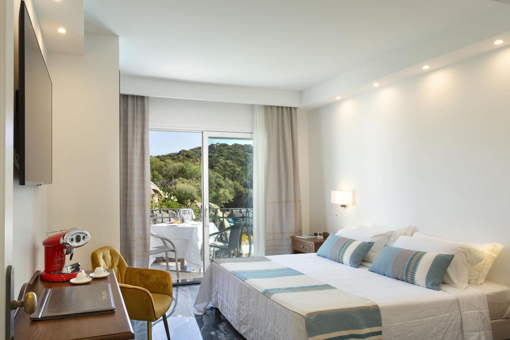 Hotel La Rocca Resort&Spa Baja Sardinia Esterno foto